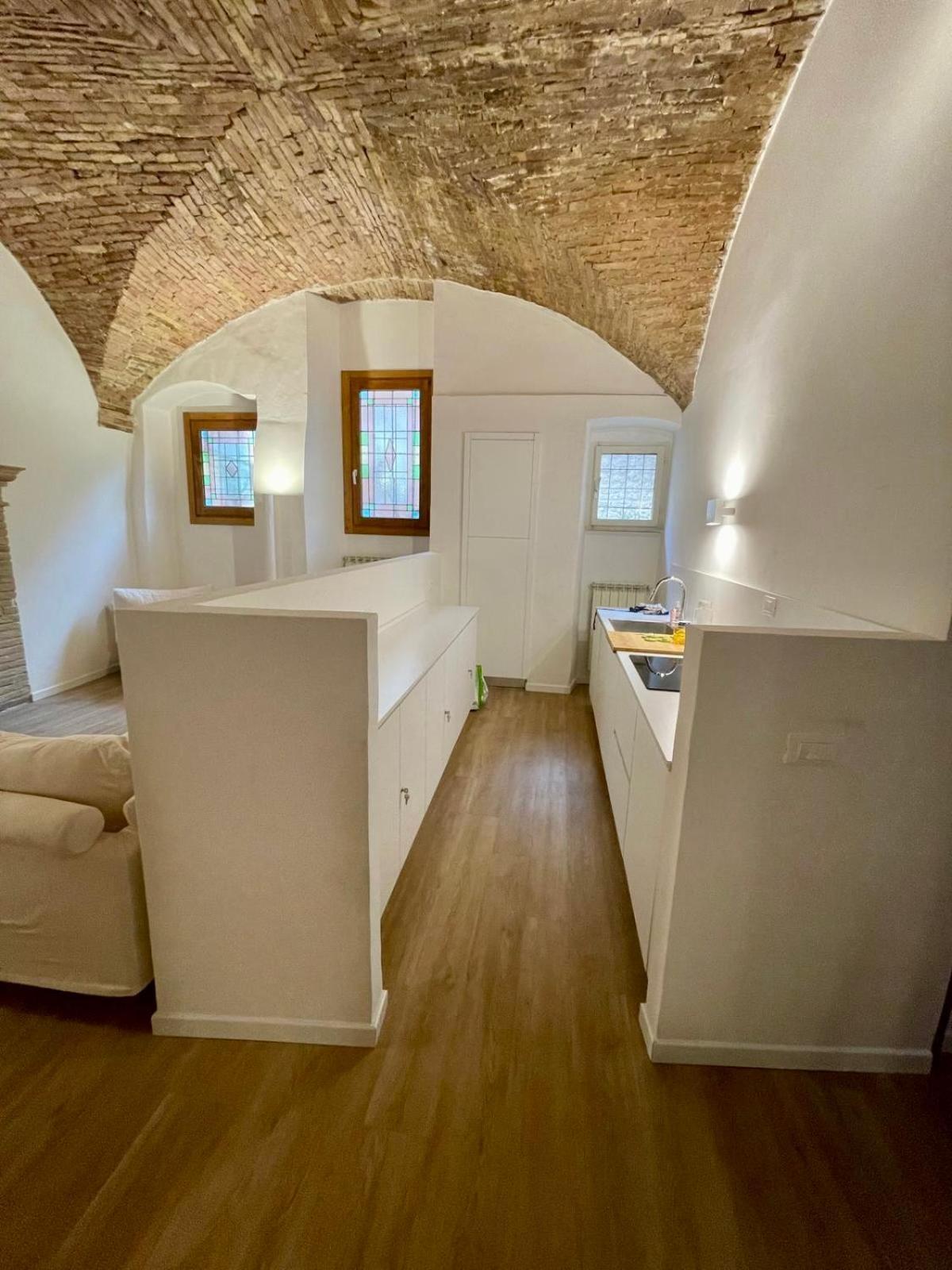 Apartamento Le Volte Di Via Portica Asís Exterior foto