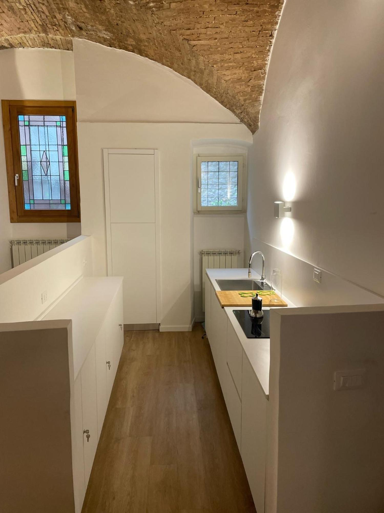 Apartamento Le Volte Di Via Portica Asís Exterior foto